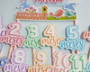Imagem 1 - Kit Completo Mesversário Bebê com Topos de Bolo e Adesivos