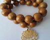 Imagem 1 - Dueto Pulseiras com Bolas Resina e Silicone Pingente Banhado