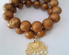 Imagem 2 - Dueto Pulseiras com Bolas Resina e Silicone Pingente Banhado
