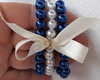 Imagem 1 - Conjunto de Pulseira Infantil Perola com Laço de Fita