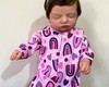 Imagem 3 - Bebe Reborn Menina Pode Banho Corpo Vinil Realista