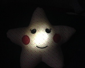 Almofada iluminada estrela