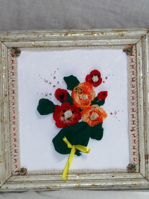 Quadro com flores de crochê