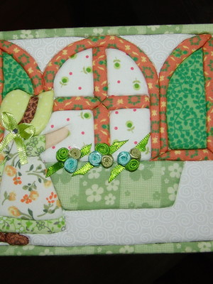 Caixa patchwork camponesa na janela