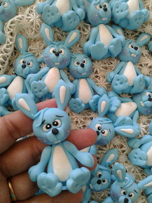 Coelhos em biscuit