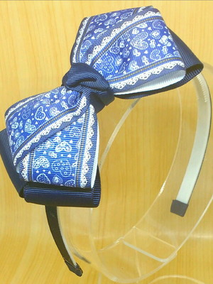 Tiara laço azul coração