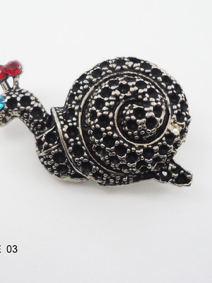 Broche caramujo niquel velho