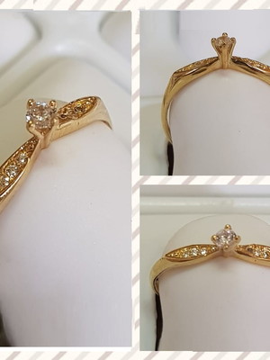 Anel ouro 18k c/ pedra de zirconia e pedras laterais