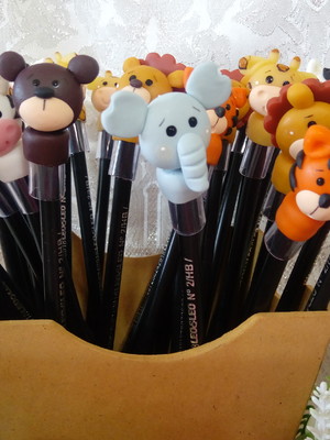 Ponteiras em biscuit safári