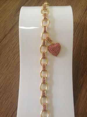 Pulseira cravejada com pingente de coração banhada ouro 18k