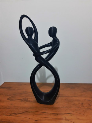 Estatua estatueta e decoração namorados dançando