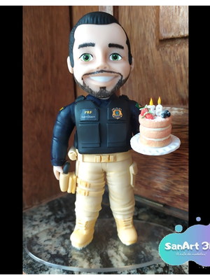 Boneco policial em biscuit