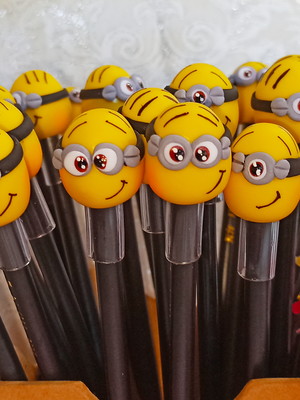 Ponteiras em biscuit minions
