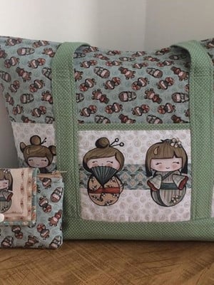 Bolsa grande e clutch kokeshi