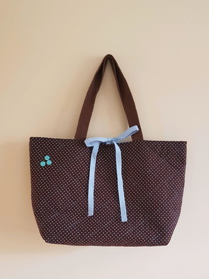 Bolsa em tecido marrom poá