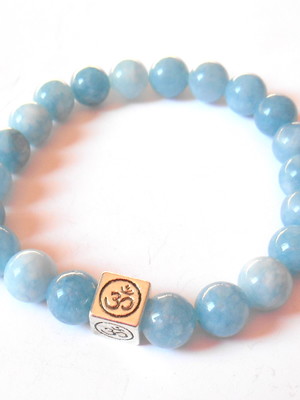 Pulseira unissex com agua marinha e simbolo om