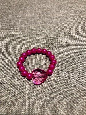 Pulseira infantil rosa com coração