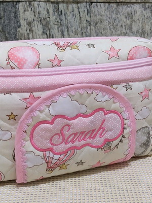 Necessaire porta fraldas e lenço umedecido