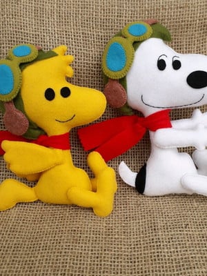 Snoopy e woodstock aviadores