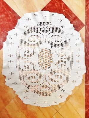 Tapete de crochê oval charmoso