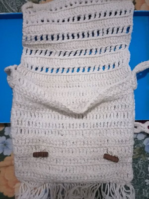 Bolsas em crochês praiana.