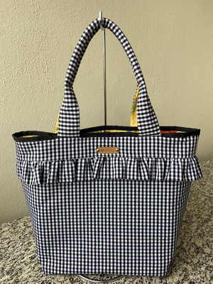 Bolsa xadrez e babadinho