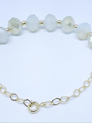 Pulseira cristal branco bicolor com bolinha dourada
