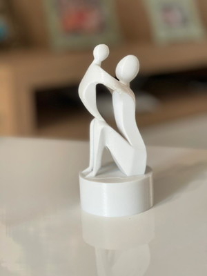 Escultura mãe e filho