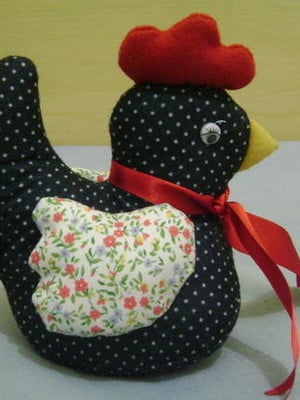 Galinha peso de porta