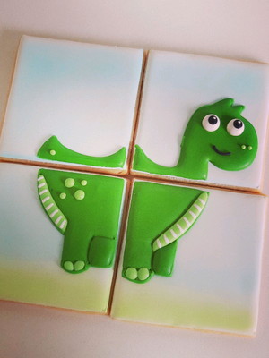 Biscoitos decorados quebra cabeça dinossauro