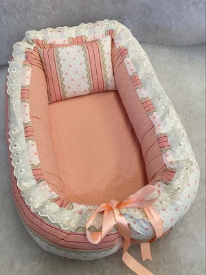 Ninho redutor de bebe menina -essencial salmão