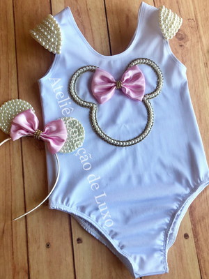 Collant da minnie rosa com pérolas e tiara
