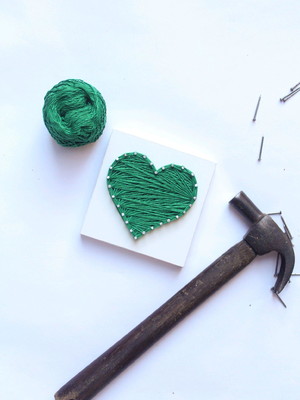 Coração verde quadro string art