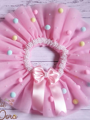 Saia tutu com cós bordado e aplicação de pompons
