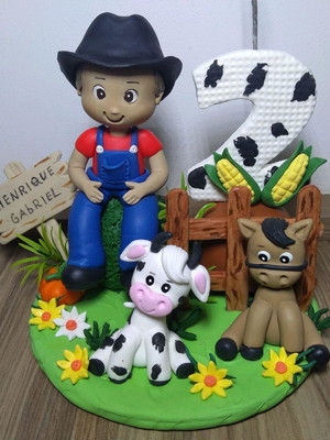 Vela de biscuit fazendinha personalizada