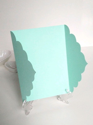Envelope verde claro com abas detalhadas