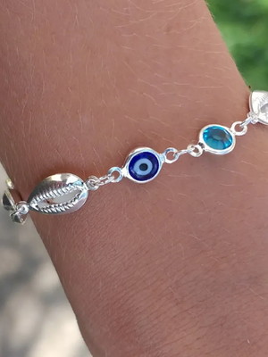 Pulseira buzios olho grego com pedra azul folheado a prata