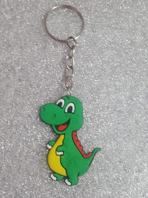 Chaveiro dinossauro verde de borracha