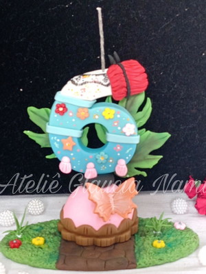 Vela topo encanto em biscuit