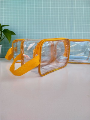 Nécessaire plástico transparente amarelo
