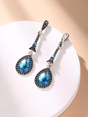 Brinco etnia gota azul