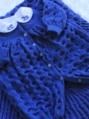 Conjunto manta macacão em tricô menino