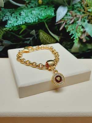 Pulseira coração com strass dourada