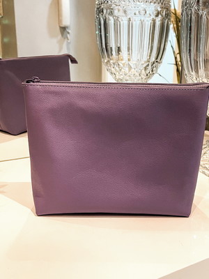 Necessaire bolsa feminina em couro lilás