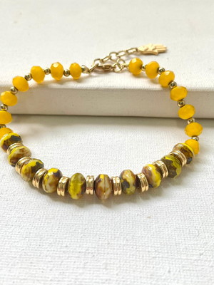Pulseira de cristais amarelos e pedras mescladas