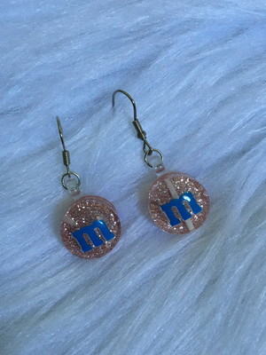 Brinco m&m rosa