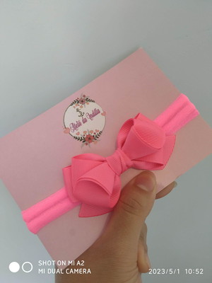 Faixinha com laço rosa neon