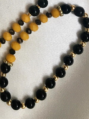 Pulseira de ônix e cristal amarelo