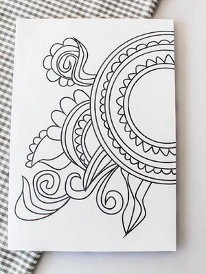 Caderno com estampa de arabesco