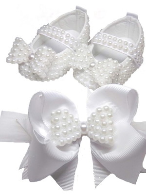 Sandalia de pérolas batizado com laço branco
